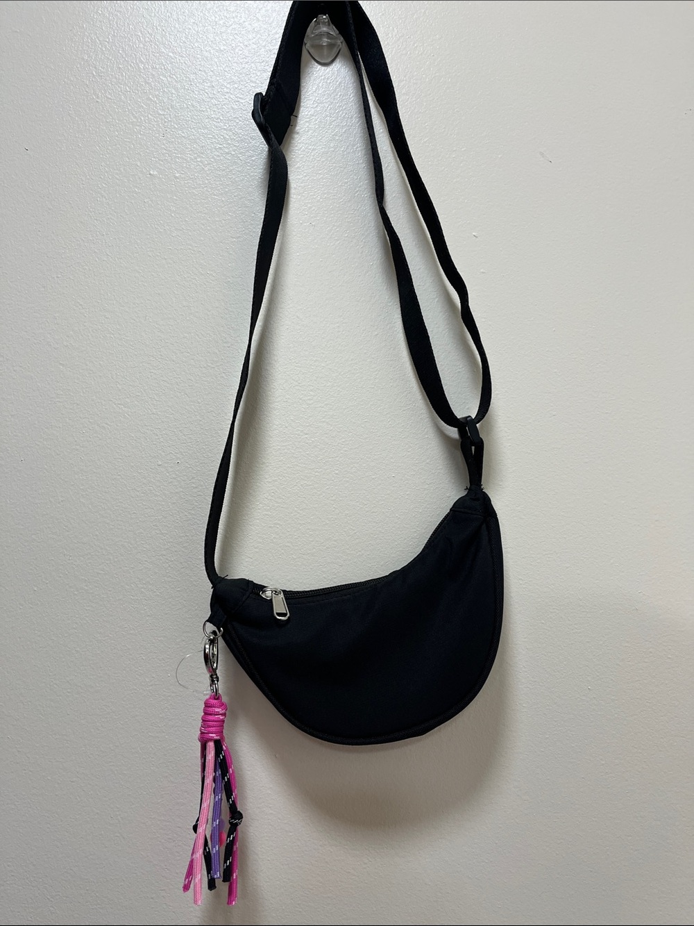 wonder nation Black Crescent Crossbody with Pink Tassel Accent